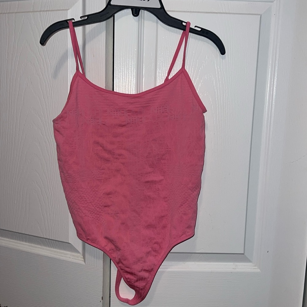 Hot pink Nike backless body suit